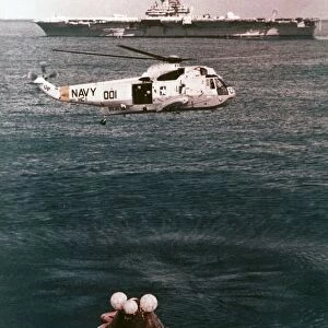 Astronauts being recovered from the sea, Apollo 16 mission, 27 April 1972. Creator: NASA