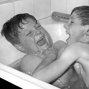 Two boys playing in the bath, Horley, Surrey, c1960-1979(?)