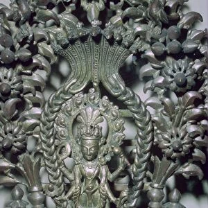 Bronze figure of Vishnu, protected by a many-headed serpent