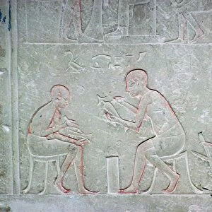 Egyptian relief showing vase painters, 14th century BC