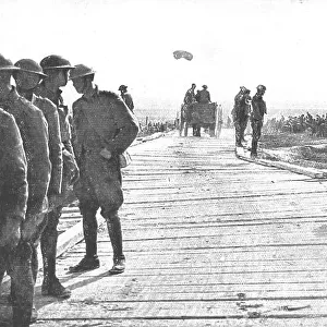 En Champagne; La route de Somme-Py a Souain, que l'ennemi avait sauter, refaite a l'aide... 1918. Creator: Unknown
