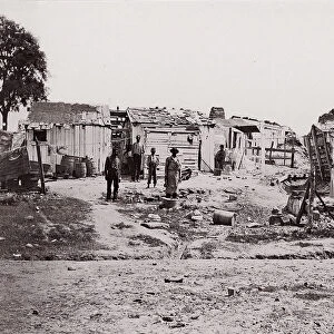 [Encampment with shacks and laundry]. Brady album, p. 129, 1861-65. Creator: Unknown