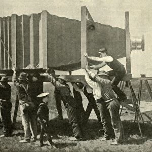 Focussing The Gigantic Camera For Work, 1901. Creator: Unknown