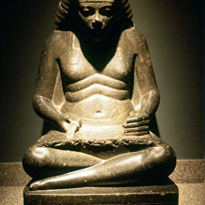 Granite statue of a seated Ancient Egyptian scribe, from Karnak, 17 / 18th dynasty, c1500 BC
