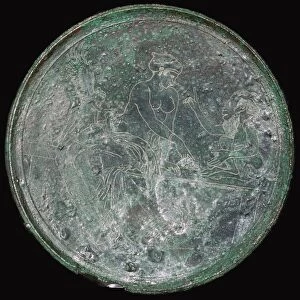 Greek bronze mirror case with Aphrodite and Pan, c350 BC
