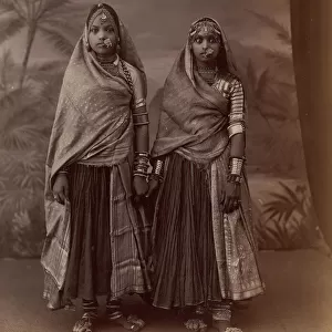 Two Hindu Women in Elaborate Jewelry, Before Studio Backdrop with Palm Trees, 1860s-70s