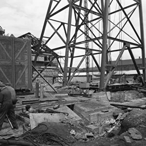 Installing a cage at Hickleton Main pit, Thurnscoe, South Yorkshire, 1961. Artist