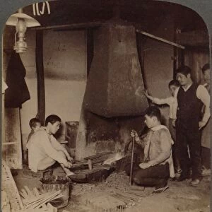 A Japanese blacksmith at his forge, Yokohama, Japan, 1904