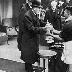 King George V presenting the FA Cup, Wembley Stadium, London, c1923-1936 (1937). Artist: Fox