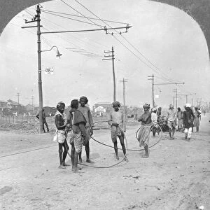 Men about to draw a heavy load, Rangoon, Burma, 1908. Artist: Stereo Travel Co