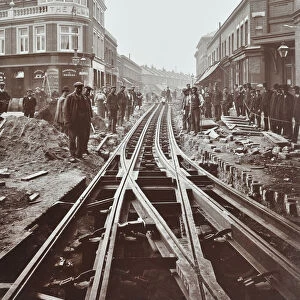 Men working on tramline electricification, Wandsworth, London, 1906