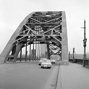 Mini on the 1959 Mobil Economy Run, Tyne Bridge in Newcastle. Creator: Unknown