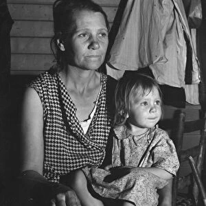Mother and child, FSA camp, Farmersville, Tulare County, California, 1939. Creator: Dorothea Lange