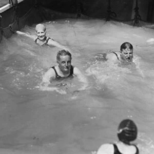 Passengers in the swimming pool on board a cruise ship, c1920s-c1930s(?)