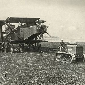 A Small Motor Tractor Getting a Huge R.A.F. Bombing Machine into Position... (1919)