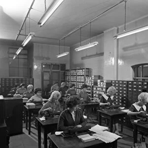 Tabulating machines in the punch room in a Sheffield Factory office, 1963. Artist