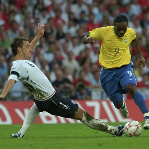 England's John Terry and Vagner Love of Brazil
