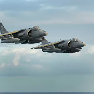 Pair of Harriers During Flypast at Sea