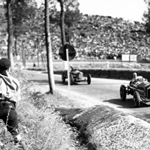 1935 Dieppe Grand Prix. Dieppe, France. 21 July 1935. Louis Chiron, Alfa Romeo Tipo-B "P3", 2nd position, leads Giuseppe Farina, Maserati 6C-34, 5th position, action. World Copyright: Robert Fellowes/LAT Photographic Ref: 35DIE02