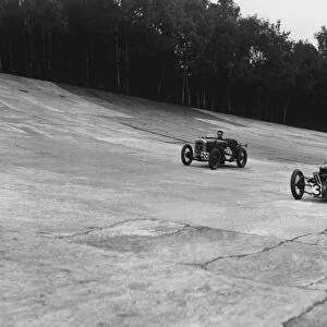 1935 LCC Relay Race: A Morgan Sports 3 Wheeler and a Austin Seven Ulster in action