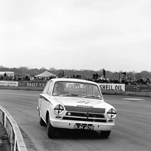 1964 British Saloon Car Championship. International Trophy Meeting. Silverstone, Great Britain. 2nd May 1964. Jim Clark (Ford Lotus Cortina), 3rd overall, 1st position in Class, action. World Copyright: LAT Photographic. Ref: B/W Print