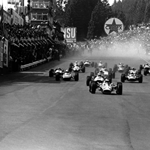 1967 Belgian Grand Prix: Jim Clark, Lotus 49-Ford, 6th position, leads Jochen Rindt, Cooper T81B-Maserati, 4th position, Michael Parkes, Ferrari 312