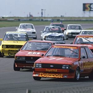 1984 British Saloon Car Championship: Richard Longman, Ford Escort, leads the field, action