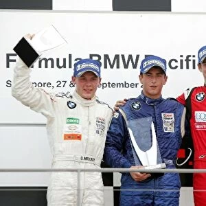 Formula BMW Pacfic: Race one podium: Ollie Millroy Motaworld 2nd, race winner Doru Sechelariu Mahara and Ross Jamison Meritus 3rd