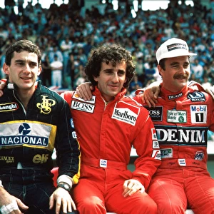 Formula One World Championship: Ayrton Senna Lotus 98T, 4th place, Alain Prost McLaren MP4 / 2C, 2nd place, Winner Nigel Mansell Williams FW11