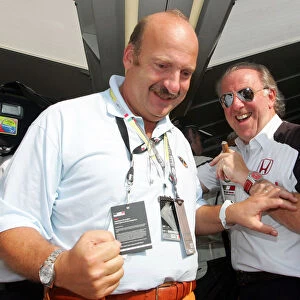 Formula One World Championship: Jimmi Rembiszewski, Marketing manager of British American Tabacco celebrates third place with David Richards