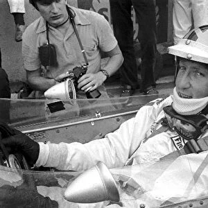 Formula One World Championship: Jochen Rindt wearing Piers Courages helmet, in preference to his own full face variety