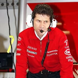 Formula One World Championship: Remi Decorzent Toyota Race Engineer looks over Cristiano Da Matta Toyota TF104