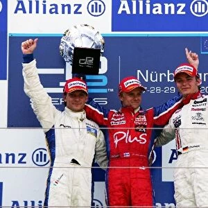 GP2: The podium: Giorgio Pantano Super Nova, second; Heikki Kovalainen Arden International, winner; Nico Rosberg ART, third