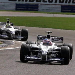 Jenson Button leads Ralf Schumacher - BMW Williams - action