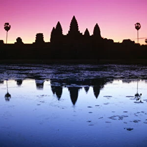 Cambodia, Angkor Wat, Silhouette Of Temple At Sunrise