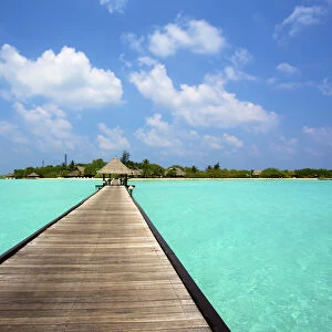 Jetty With Cabana Over Crystal Clear Turquoise Sea, Maldives