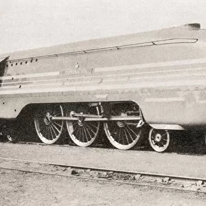The L. M. S. 4-6-2 streamlined locomotive "Coronation". These high speed locomotives were built to haul the Coronation Scot which covered the 401 miles from Euston to Glasgow in 6. 5 hours. They were named to celebrate the Coronation of George VI. From The Coronation in Pictures, published 1937
