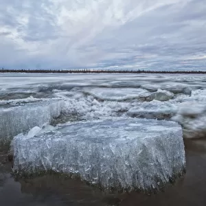 Long Exposure Of The Ice Flowing Down The Porcupine River After It Broke Up; Old Crow, Yukon, Canada