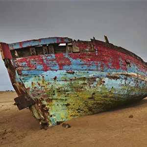 Weathered shipwreck on a beach, Devon, Great Britain