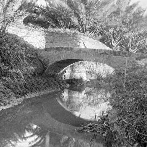 World War One photographs in Iraq (Mesopotamia). British Royal Engineers. Bridge over the creek; Baqubah, Iraq