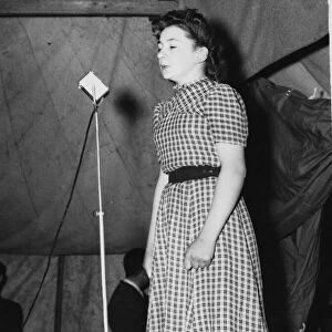16-year old Yvette Glinel Sings for personnel of an RAF Spitfire Wing at their camp