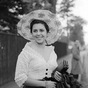 1953 Clothing Ascot Fashion Hazel Wood-Smith wearing a wide brimmed bonnet style hat