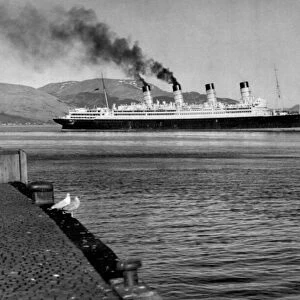 The 45, 000 ton liner Aquitania arrives at Gourock Pier on the The Clyde