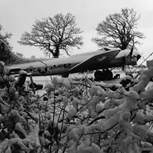 US 8th Air Force B-17 Flying Fortress under heavy snow. Within the hour the bomber will