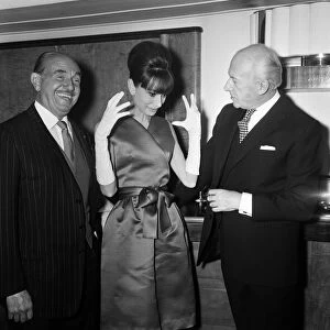 Actress Audrey Hepburn pictured with Jack L Warner (left