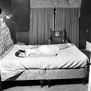 Actress Joan Collins sleeping. December 1953 D7585-002