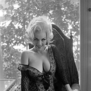 Actress Liz Renay poses for pictures wearing underwear. November 1969 Z11089-006