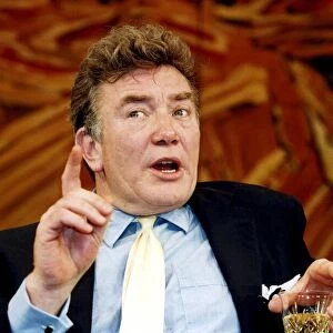 Albert Finney holding drink acting in play Reflected Glory