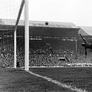 Andy Rankin, the Everton goalkeeper, saves from Hunt. Liverpool v Everton, final score
