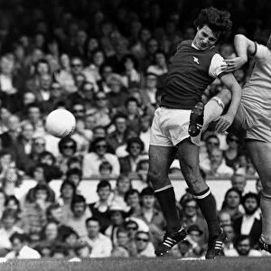 Arsenal versus Nottingham Forrest, 1977. Kenny Burns tackles Frank Stapleton